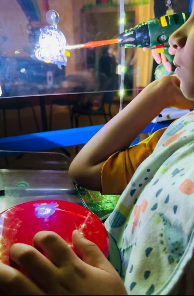 Student accessing the window art activity.