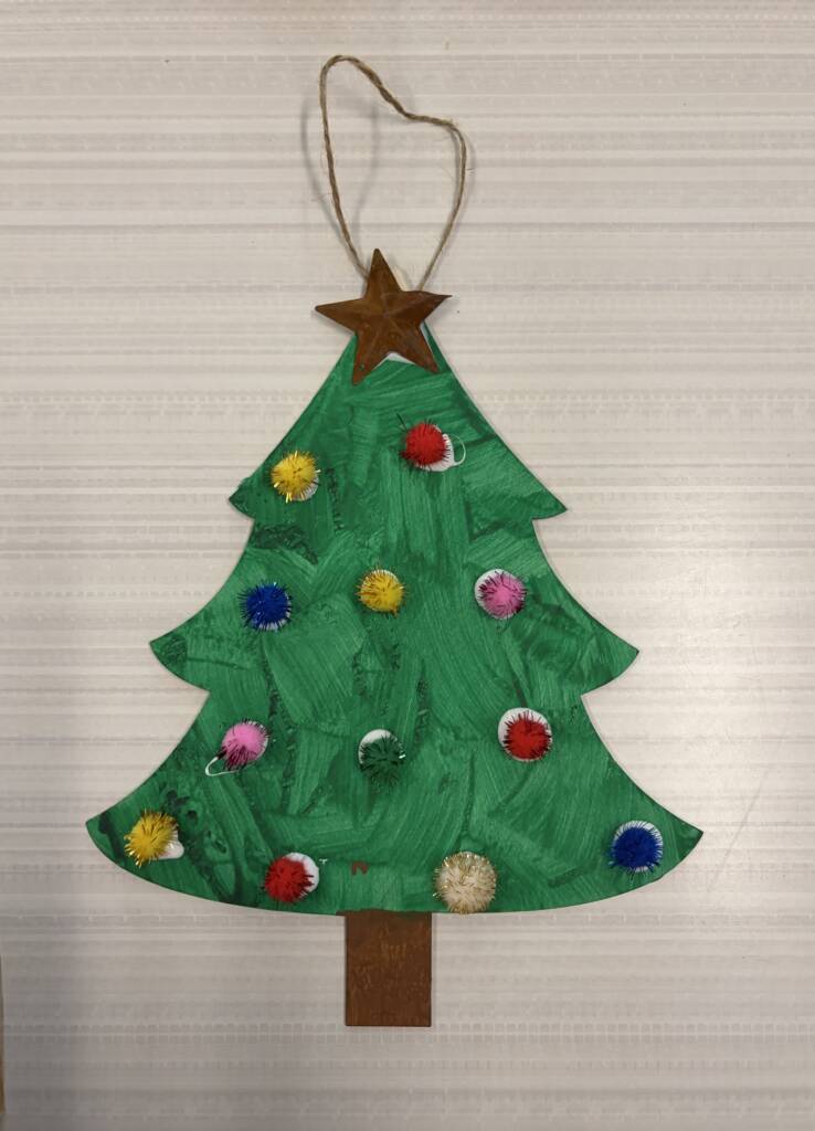 Painted and decorated wooden Christmas tree