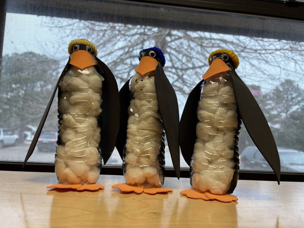Penguins water bottle craft.