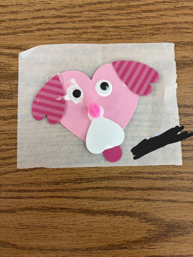 Heart foam craft that looks like a puppy with heart face and ears. 
