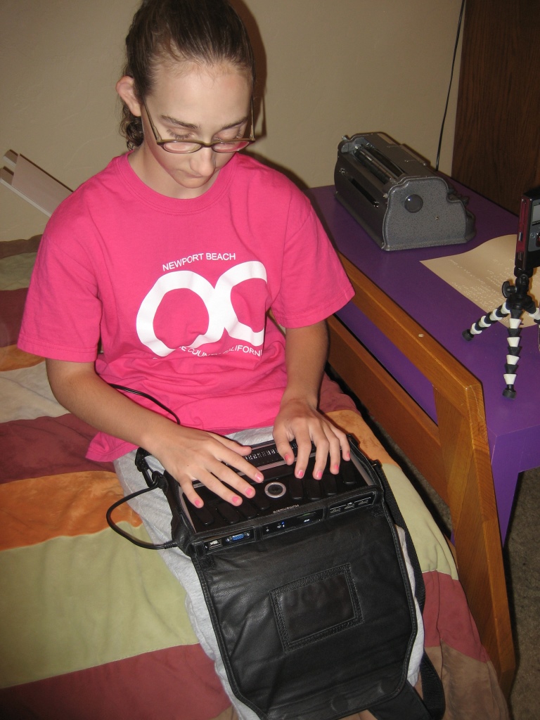 As a student in middle school, Haylee reads Harry Potter in her room. Reading Harry Potter