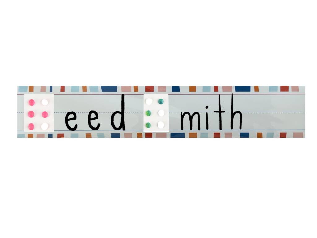 Reed Smith with the "R" and "S" in braille using candy dots.