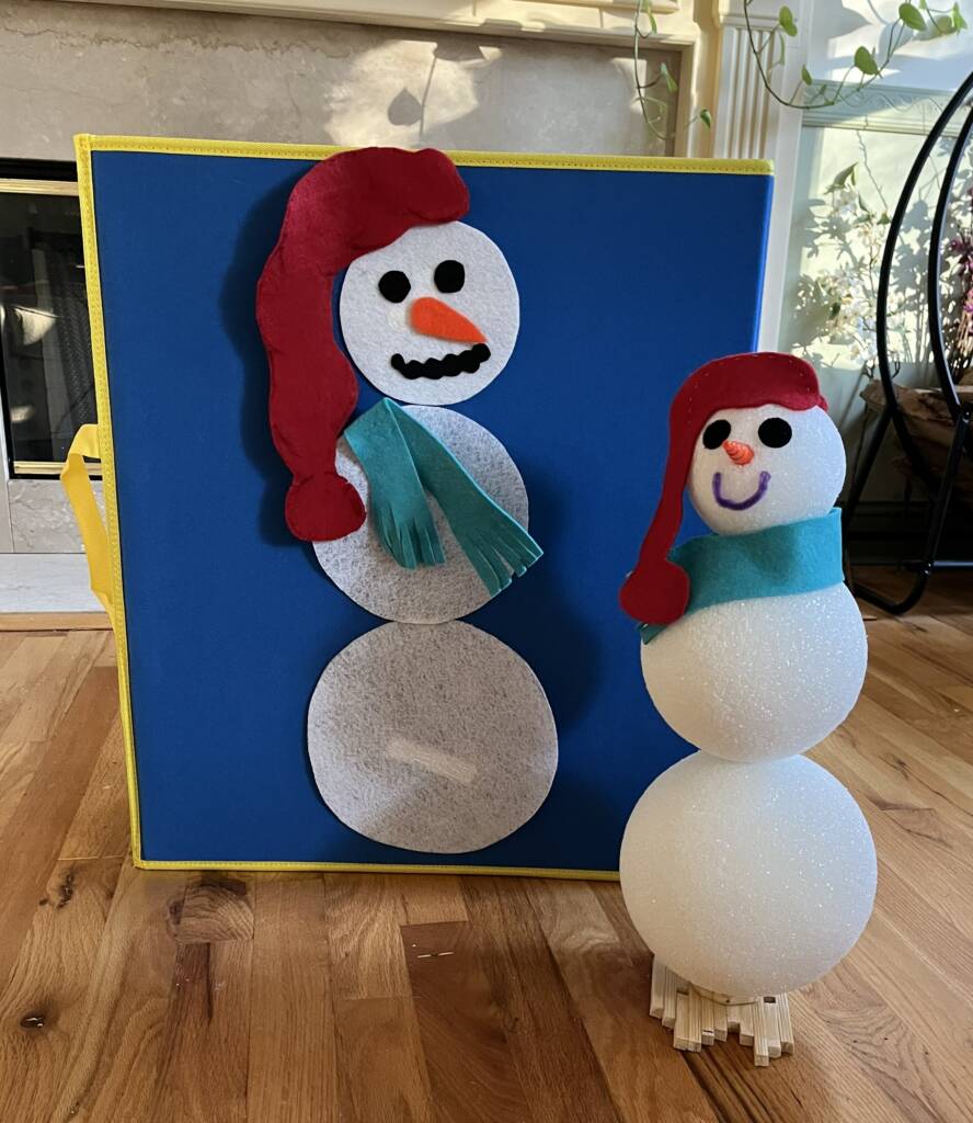 Felt board snowman and a styrofoam snowman.