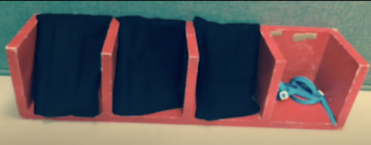 Calendar box with four slots and flaps covering the activities that are finished Calendar box with four slots