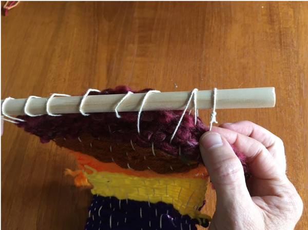 Putting the dowel through Putting the dowel through