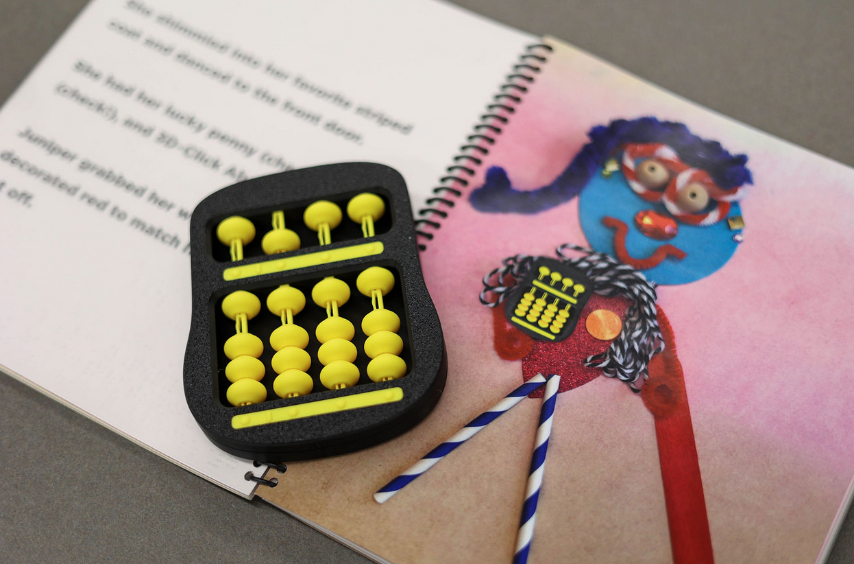 3D click abacus on an open page book, Juniper and the Red Swoosh.