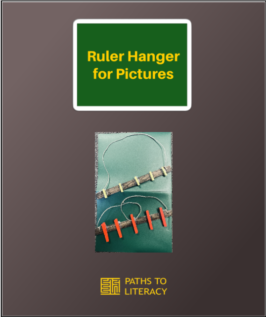 Ruler hanger for pictures pin.
