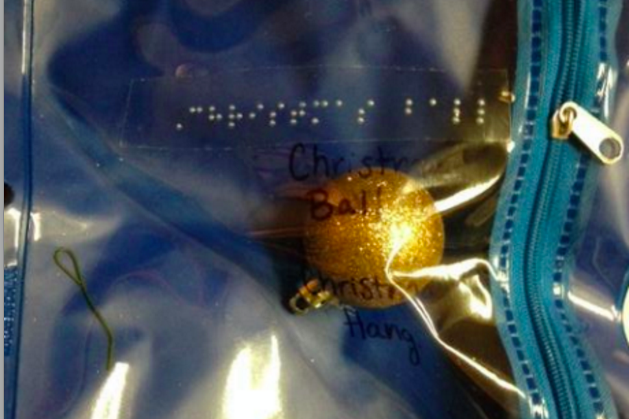 Page of tactile experience book about trimming Christmas tree